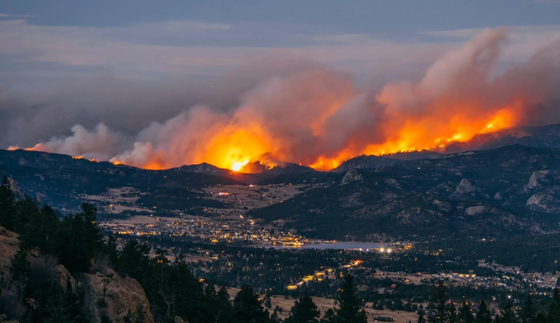 Cameron Peak Fire burning through Colorado mountain forest near Fort Collins, 2020